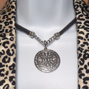 Intricate Silver Pendant Necklace with Black Cord